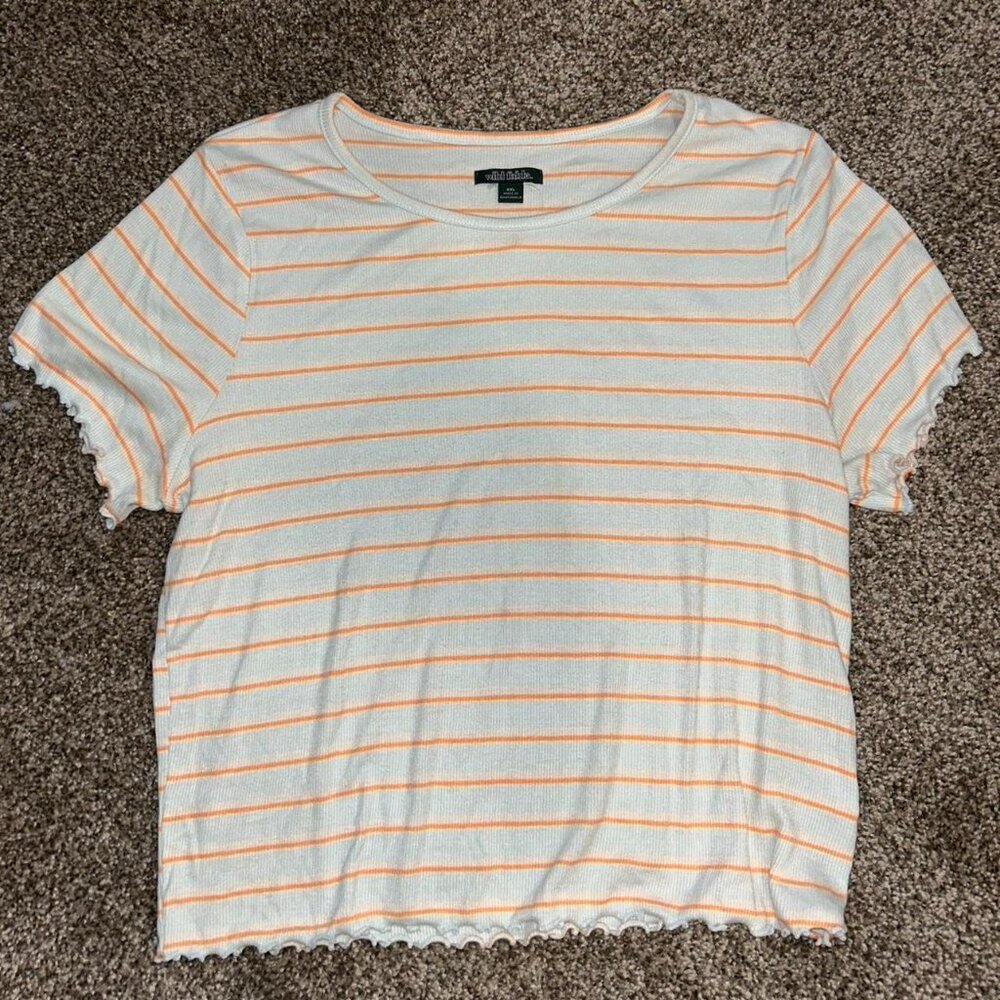 baby blue shirt with orange and white stripes